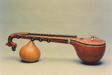 The Veena (Sanskrit: वीणा) is a plucked stringed instrument originating in ancient India, used mainly in Carnatic classical music and Hindustani classical music. Hindustani Classical Music, Old Musical Instruments, Indian Musical Instruments, Instruments Art, Indian Classical Music, 3d Art Drawing, Pooja Room Door Design, Indian Music, Metal Tree Wall Art