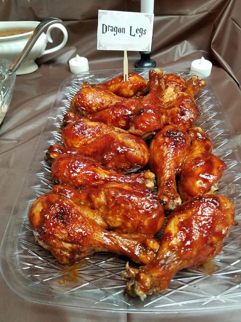 This was easy. BBQ Chicken Legs. I Baked Chicken Legs in the oven, just standard salt, pepper, and bake at 350 degrees, then covered in BBQ sauce. Savory Harry Potter Food, Harry Potter Themed Food Dinner Parties, Harry Potter Birthday Food, Harry Potter Theme Food, Harry Potter Foods, Hogwarts Food, Chicken Legs In The Oven, Harry Potter Party Food, Harry Potter Themed Food