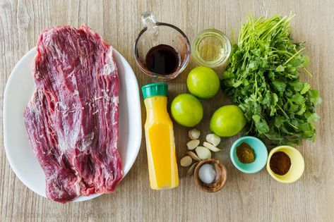 Authentic Carne Asada is all about the marinade and giving the meat time to soak in all the flavors. The fresh cilantro-garlic-lime marinade will become your go-to for Flank Steak. We use this recipe to make the best Carne Asada Mexican Street Tacos! #carneasada #streettacos #mexicanrecipes #steak #flanksteak Mexican Steak Marinade, Steak Taco Marinade, Authentic Carne Asada Recipe, Authentic Carne Asada, Carne Asada Street Tacos, Asada Street Tacos, Mexican Marinade, Carne Asada Recipes Marinade, Mexican Street Tacos