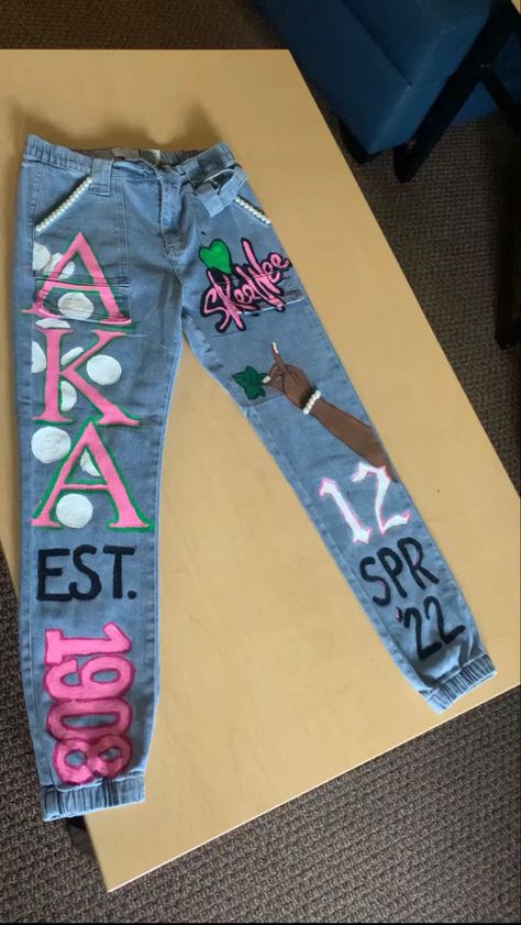 Aka Painted Jeans, Sorority Painted Jeans, Spray Paint Pants, Painting On Pants Ideas, Pants Painting Ideas, Aka Outfits, Hand Painted Pants, Alpha Kappa Alpha Clothing, Aka Gifts