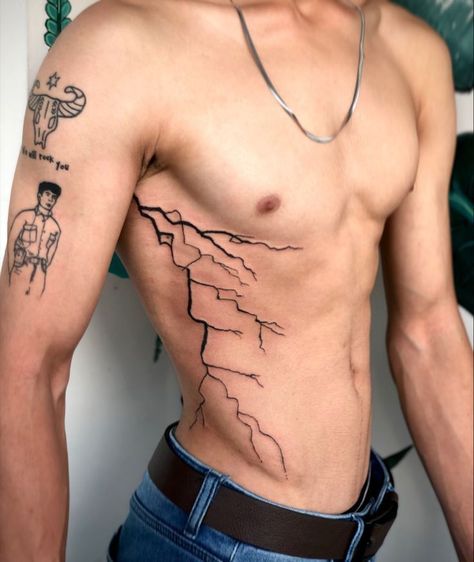 Men Lighting Tattoo, Cool Tats Men, Lighting Tattoo Chest, Arm Tattoo Lightning, Lightning Tattoo Side Rib, Lightning Bolt Tattoo Stomach, Lightning Tattoo Leg Men, Lightning Tattoo On Ribs, Lightning Side Tattoo