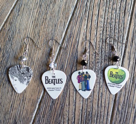 beatles guitar pick earrings The Beatles Guitar, Beatles Guitar, Guitar Pick Jewelry, Guitar Pick Earrings, Guitar Picks, Beaded Hoop Earrings, Beaded Hoops, Denver Co, How To Make Earrings