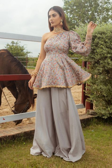 Safaa one shoulder peplum kurta and flared sharara set Flared Sharara, Kurta And Sharara Set, Kurta And Sharara, Kalamkari Dresses, Sharara Designs, Haldi Outfits, Trendy Outfits Indian, Biology Lessons, Outfits Woman