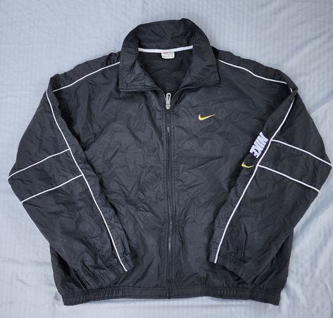 Vintage 1990s Black Yellow Swoosh Nike Windbreaker Jacket  In great condition  Semi Loose Cuffs 9.5/10 XL 27.5 x 28.5 Pit to Pit Any questions feel free to reach out! Nike Noir, Nike Windbreaker Jacket, Nike Windbreaker, Vintage Clothes, Windbreaker Jacket, Black N Yellow, Ideias Fashion, Favorite Outfit, Vintage Style