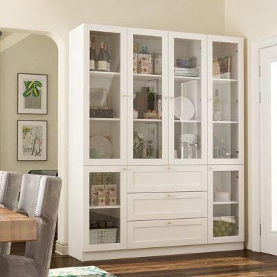 Looking for a versatile storage solution that can showcase your favourite items? Check out this stylish white cabinet set! With 6 doors, 5 shelves, and 3 drawers. It offers ample space for all your kitchenware, books, and other belongings. The door provides easy visibility, making it perfect for displaying your favourite pieces. Plus, its modern style design ensures it will seamlessly integrate into your home decor. Whether you need a china cabinet, bookcase, bathroom cabinet, or office storage White Kitchen Pantry Cabinet, White Kitchen Pantry, Kitchen Storage Units, Cabinet Bookcase, Accent Storage Cabinet, Pantry Storage Cabinet, Wooden Storage Cabinet, Dining Cabinet, Kitchen Pantry Storage