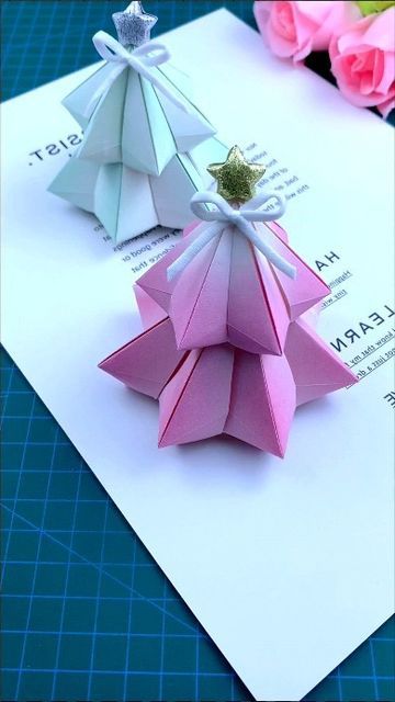 paper crafts creator on Instagram: "Simple and beautiful origami Christmas tree, fold it for the person you like. #Handmade #Origami #Christmastree #Handmade #diy #Origami #tutorial paper craft ideas" Folded Paper Christmas Tree, Origami Xmas Tree, Origami Xmas, Christmas Tree Paper Craft, Origami Christmas Ornament, Diy Paper Christmas Tree, Craft Ideas Paper, Origami Christmas Tree, Beautiful Origami