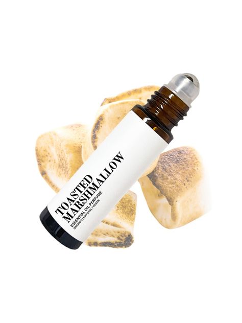 All natural and organic Toasted Marshmallow Perfume Oil is a great fragrance to wear for anyone looking for a cozy and sweet scent to wear. HOW IT SMELLS This perfume has a delicious sweet vanilla aroma with a hint of woody and spice notes. INGREDIENTS  Fractionated coconut oil, vanilla, cinnamon, nutmeg and cedarwood essential oils. PRODUCT PACKAGING This product is made in a 10mL glass bottle with a stainless steel roller ball and plastic cap. HOW TO USE Roll on wrist, temples, back of the nec Roll On Perfume Oil, Marshmallow Roll, Cinnamon Perfume, Marshmallow Perfume, Body Oil Perfume, Roller Perfume, Cinnamon Fragrance, Candy Perfume, Fragrance Lab