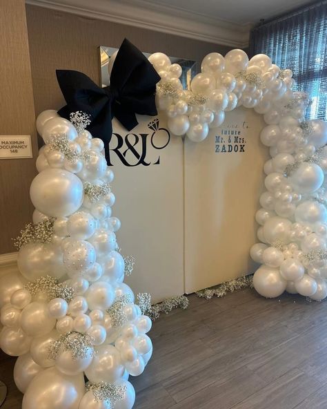 Celebrate your love with elegance! ✨ Our stunning white wedding decor, adorned with delicate gypsophila flowers, creates a gentle and romantic atmosphere. The perfect backdrop for saying ‘Cheers to the Future Mr. & Mrs.!’ 💍🌸 #WeddingDecor #MrAndMrs #ElegantWeddings #Gypsophila #LoveInBloom #CheersToLove Black And White Balloon Garland, Garland With White Flowers, Entrance Backdrop, White Balloon Garland, White Wedding Decor, Black And White Balloons, Christmas Comics, Bride Shower, White Balloons