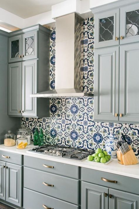 Check out these 23 gorgeous blue kitchen cabinet ideas and you'll want to paint yours at home ASAP. Tiles Hexagon, Blue And White Tiles, Trendy Kitchen Backsplash, Серая Кухня, Blue Kitchen Cabinets, Kabinet Dapur, Herringbone Backsplash, Kitchen Backsplash Designs, Kitchen Wall Tiles