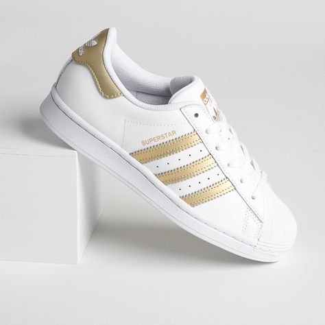 Womens adidas Superstar Athletic Shoe - Cloud White / Gold Metallic | Journeys Gold Sneakers Outfit, Adidas Superstar Gold, White And Gold Sneakers, White And Gold Shoes, Gold Trainers, Adidas Gold, Adidas White Shoes, Rose Gold Adidas, Adidas Superstar Women