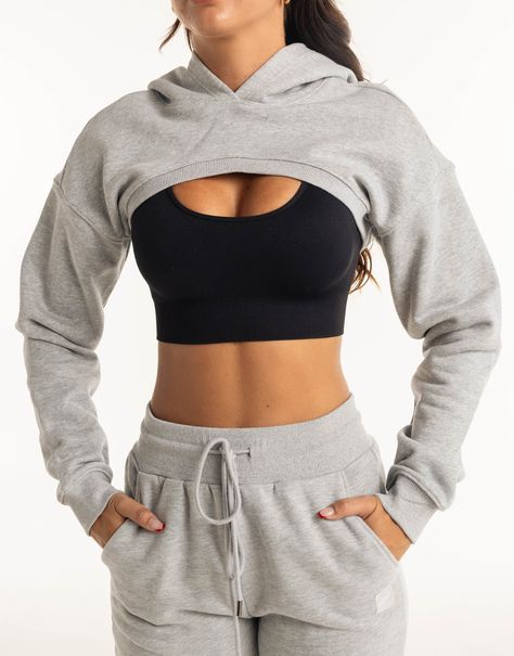 Meet the High Cut Hoodie, the perfect layering piece that deserves to be a part of the all-year rotation. The ultra cropped length is the High Cut Hoodie's best attribute, great for showing off your sportsbra and/or bikini. Add in a hoodie and you've got a top that can provide style and warmth - Super soft cotton/polyester blend - In-trend ultra cropped silhouette - Large hood - Designed to flatter every size - Worn by our inhouse team for the perfect fit 62% Cotton, 38% Polyester Bella is wearing a Small She is 170cm (5'6") tall with an 33" bust, a 25" waist and 36" hip Grey Cropped Hoodie Outfit, Super Cropped Hoodie Outfit, Hoodie Inspiration, Super Cropped Hoodie, Cropped Hoodie Outfit, Cut Out Hoodie, Dance Fits, Cut Hoodies, Super Crop Top