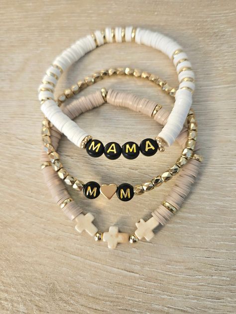 set of 3 white and gold beaded "mama" (or otherwise specified) bracelet with black letter beads, gold bracelet with initials (names) and heart, tan bracelet with semi precious magnesite crosses Diy Mama Bracelet, Boy Mom Bracelet, Gold Bracelets With Initials, Name Bracelet Ideas, Handmade Things To Sell, Bracelets To Sell, Cute Gifts For Mom, Letter Bracelets, Cross Bracelets