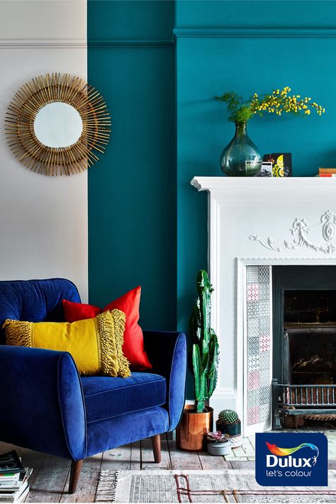 Opulent Teal Lux paired with a warm neutral will create an inviting reading corner.  #Teal #ColourTrends #Fireplace #FeatureWall Teal Walls Living Room, Teal Living Room Decor, Teal Rooms, Teal Living Rooms, Feature Wall Living Room, Living Room Warm, Teal Walls, Living Room Color Schemes, Cosy Living Room