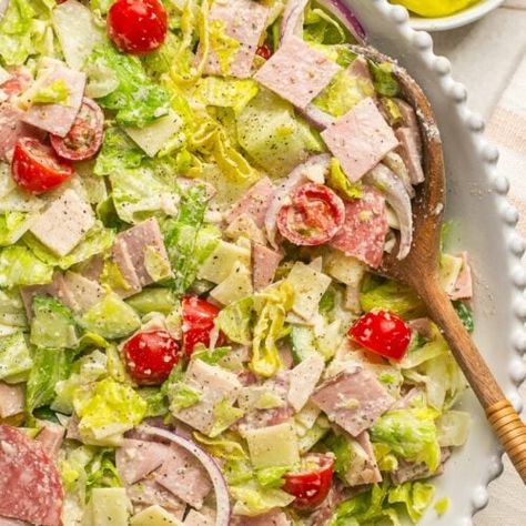 Chopped Italian Grinder Salad Recipe (with Creamy Dressing) - Mary's Whole Life Cold Dinner Ideas, Italian Grinder Salad, Italian Grinder, Hot Weather Meals, Grinder Salad, Turkey Chops, Sliced Salami, Pepperoncini Peppers, Satisfying Salads