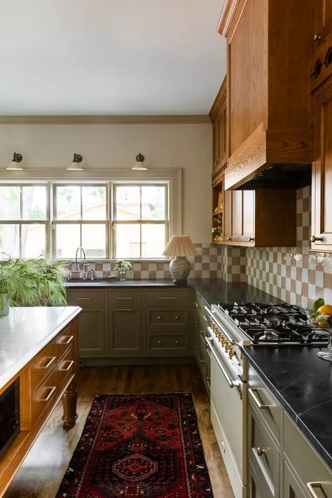 Two-tone green and wood cabinets paired with a checkerboard backsplash brought character back to the kitchen in this 1890 Queen-Anne style. Go inside the full home renovation. 2 Tone Kitchen, Mudroom Makeover, Upper Kitchen Cabinets, Craftsman Kitchen, Kitchen Design Plans, Craftsman Bungalows, Green Kitchen, St Paul, Wood Cabinets