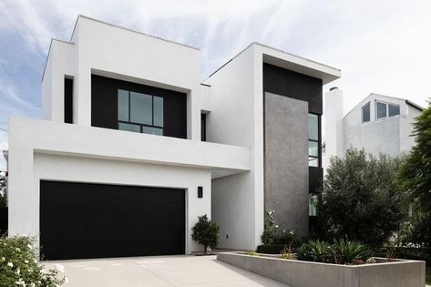 Exterior Garage Lighting Ideas and Inspiration | Hunker Two Tone Exterior House Colors, Modern Garage Doors, Exterior House Color, Modern Garage, Minimalist House Design, Farmhouse Exterior, Minimalist Architecture, Exterior House Colors, Craftsman House