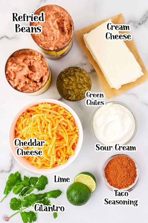 Taco Night Dip Ideas, Diy Fritos Bean Dip, Bean And Queso Dip, Championship Bean Dip, Refried Bean Dip Crockpot, Spicy Bean Dip Recipes, Mexican Trash Dip, Nacho Bean Dip, Cream Cheese Bean Dip Recipes