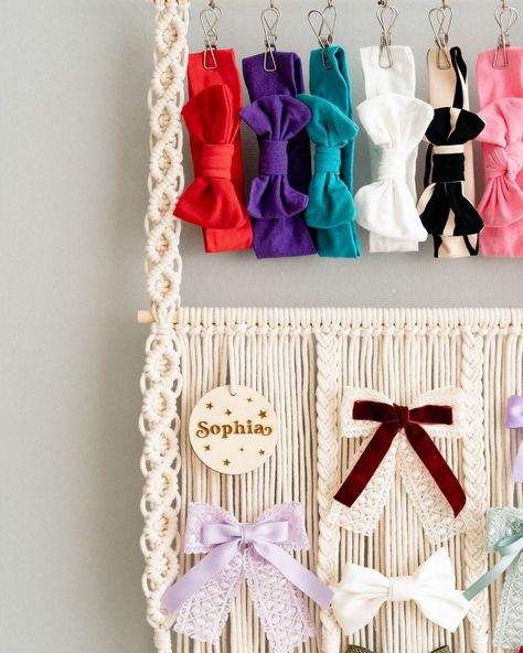 Unleash the boho vibes! This handcrafted macrame bow holder with a custom wooden name sign is the perfect way to organize and display your little one's headbands, clips, and bows, adding a touch of jungle charm to their nursery. 👉 Ready to explore more? Visit us at https://beandaikon.etsy.com/listing/1730366295 or reach out to us directly. #BeanDaikon #MacrameWallHanger #HomeDecor #HomeMade #HomeDecor #InteriorDesign #MacrameLove #HomeDecorIdeas #UniqueGifts #HomeDecorInspiration #Handmad... Macrame Bow Holder Diy, Macrame Bow Holder, Macrame Bow, Nursery Space, Macrame Wall Hanger, Wooden Name Signs, Nursery Organization, Wooden Names, Bow Holder