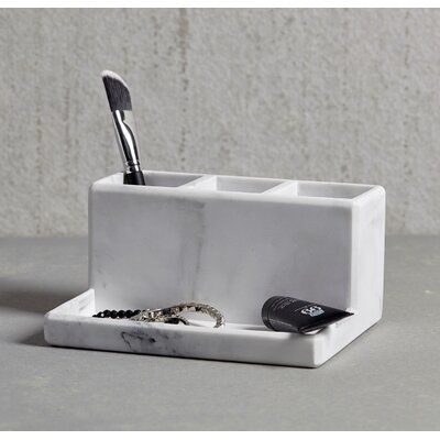 A new coordinate to popular selling line. Made of resin makes this piece durable. The marble finish look is classic for not just the bathroom counter, but for makeup, a nightstand, and a desk area! Think outside the ‘box’ of this organizer. 3 part organizer. | Ivy Bronx Rolfe Toothbrush HolderCeramic in Gray/White, Size 4.0 H x 6.0 W x 8.0 D in | Wayfair | Organization Ceramic Makeup Organizer, Clay Organizer, Ideas Ceramica, Ceramic Toothbrush Holder, Counter Top Accessories, Compartment Organizer, Desk Area, Makeup Holder, Marble Finish