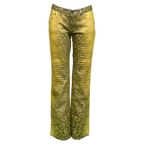 Resurrection is pleased to offer a pair of vintage Roberto Cavalli yellow denim high-waisted pants with all-over python snake print with center-front zipper with gold-tone hardware, and straight leg cut. Size Small Cotton Denim Made in Italy Excellent Vintage Condition Closet Manifestation, Snakeskin Pants, Vintage Roberto Cavalli, Activewear Photoshoot, 2024 Fits, Yellow Clothes, Yellow Denim, Python Snake, Vivid Dreams