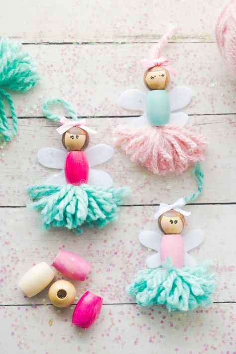 Pom pom fairy craft Plaid Online, Crafts For Teens To Make, Fairy Crafts, Pom Pom Crafts, Clothespin Dolls, Diy Fairy, Peg Doll, Bookshelf Decor, Angel Ornaments