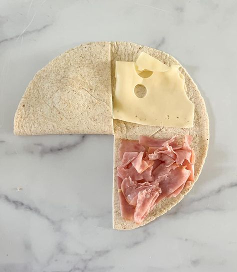 Folded Wrap Combinations, Ham Egg And Cheese Tortilla Wrap, Folded Wrap Sandwich Ideas, Folded Wraps Ideas, Ham And Turkey Lunch Meat Ideas, Ham And Cheese Burritos, Ideas With Tortilla Wraps, Ham Cheese Quesadilla, Easy Lunch Meat Wraps