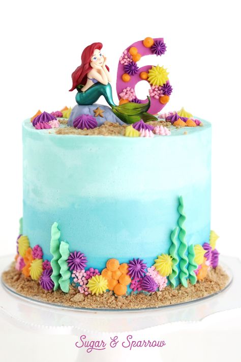 An Ariel-themed birthday cake for my 6 year-old niece. Featuring Under The Sea buttercream | Sugar & Sparrow | #thelittlemermaidcake #arielcake #littlemermaidcake #disneycake #birthdaycakes #cakedesign #partycakes #undertheseacake Mermaid Birthday Cake Ideas, The Little Mermaid Cake, Birthday Cakes Girls Kids, Sirenita Cake, Little Mermaid Birthday Cake, Mermaid Birthday Cake, 6th Birthday Girls, Ariel Cake, Little Mermaid Cake