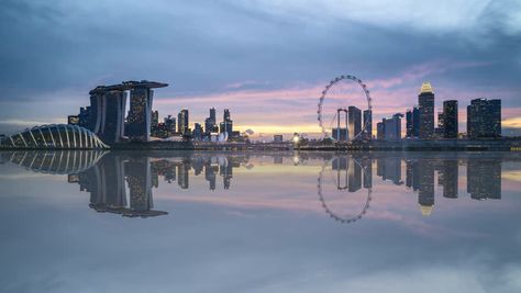 Stock video  4k UHD time lapse of beautiful sunset at Marina Bay Singapore city skyline with reflection effect. Zoom in M By MEzairi  Stock footage ID: 1012850693 City Landscape Photography, Marina Bay Singapore, Singapore Skyline, Singapore City, World Cities, Travel Time, City Landscape, Laptop Wallpaper, Time Lapse