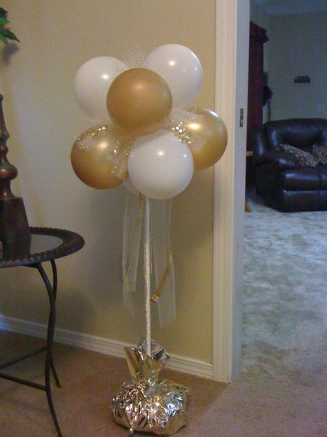 50th anniverary balloon bouquet. The dowel rod is inserted in a floral foam block with bags of beans to weigh it down, all covered in tissue paper! 50th Wedding Anniversary Decorations, 60th Anniversary Parties, 50th Anniversary Decorations, 25th Anniversary Party, 50th Wedding Anniversary Party, Wedding Anniversary Decorations, 50th Anniversary Party, 60 Wedding Anniversary, 50 Years Anniversary