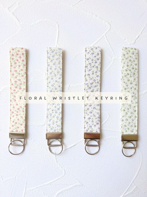 Floral Wristlet Key Ring 🌸  -100% Cotton -Each lanyard will come in a organza bag ready to gift to your loved ones or a little gift for yourself! 🫶🏻  Our wristlet lanyard will add a wonderful touch to your keys, keychains, bags and etc!  It will be easier to spot your keys and never loose your keys~  -Silver color hardware  (Key fob length)  6.5 in (length) (including the hardware)  1 in (wide)  -Each lanyard will be handmade and made to order Wrist Lanyard For Keys, Key Lanyard Aesthetic, Sew Keychain, Car Keys Keychain Ideas, Lanyard Aesthetic, Wristlet Lanyard, Floral Keychain, Handmade Wristlet, Key Keychain