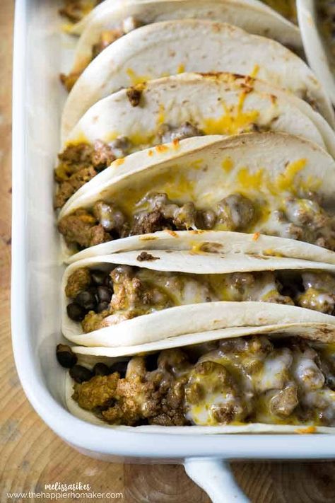 These easy oven baked soft tacos are a delicious and easy way to feed a crowd! Way less messy, especially for the kids! Baked Soft Tacos Ground Beef, Baked Soft Tacos, Ground Turkey Taco Recipes, Easy Tortilla Recipe, Soft Tacos Recipes, Oven Baked Tacos, Turkey Tacos Recipes, Baked Tacos, Chicken Soft Tacos