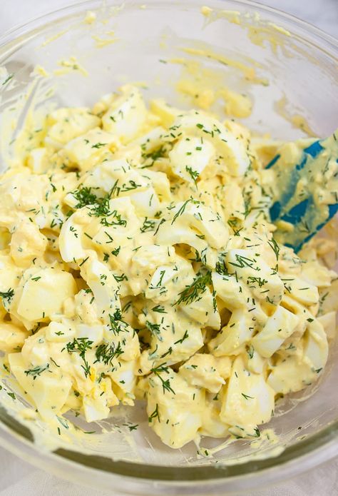 This Lemon Dill Egg Salad is healthy and easy to make! It's made with hard boiled eggs that are tossed in a homemade lemon herb dressing. The dressing is made with mayo, Dijon mustard, lemon juice, and fresh dill. It makes a perfect egg salad sandwich. This recipe is gluten free and great for lunch or a light dinner. The flavors are light and delicious. It can also be served in a wrap or with lettuce wraps and also as a dip with crackers. A unique twist on the classic! Salad With Pickles, Tastefully Simple Recipes, Classic Egg Salad, Easy Egg Salad, Creamy Eggs, Pickled Eggs, Egg Salad Sandwiches, Tastefully Simple, Egg Salad Recipe