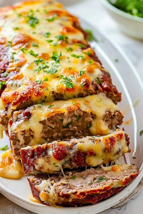 Get ready to fall in love with Philly cheesesteak meatloaf! Packed with ground beef, peppers, onions, and melty Provolone, it's heaven on a plate! Meats That Go With Mashed Potatoes, Meatball Loaf Recipes, Philly Steak Meatloaf, School Western Burgers Recipes, Ground Sirloin Meatloaf, Healthy Beef Mince Recipes, Philly Cheese Steak Meatloaf Recipes, Philly Cheese Meatloaf Recipe, What To Eat With Meatloaf