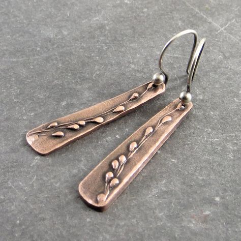 These copper drop earrings are made from PMC (precious metal clay) that has been rolled into a one-of-a-kind mold made from Panic Grass - a grass that is native to MN. The clay has been dried, sanded, and then fired in a high temp kiln. The organic binders burn off leaving a pure copper piece.  They have been oxidized and lightly brushed to bring out the details of the grass. The ear wires are hand-made from torch-balled sterling silver. They have also been oxidized and brushed to match the earr Clay Metal Jewelry, Copper Clay Jewelry, Etched Copper Jewelry, Rivet Jewelry, Forest Earrings, Copper Clay, Pmc Jewelry, Precious Metal Clay Jewelry, Silver Metal Clay