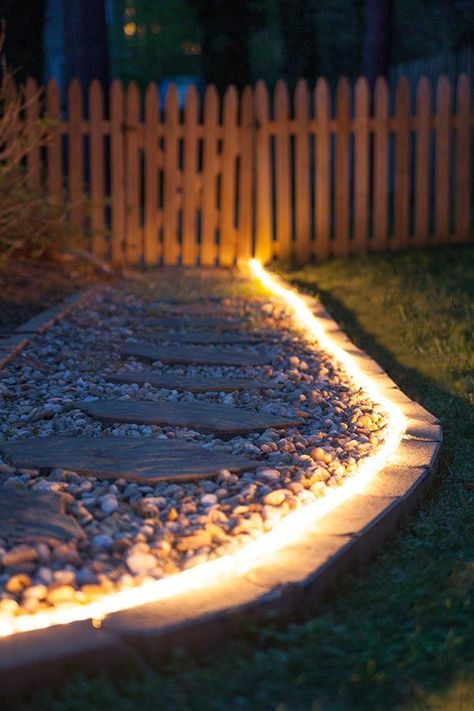 Brighten gardens and walkways using rope light as pathway lights! Great along stone walkways and a perfect #DIY idea for backyard lighting and weddings too! Outdoor Rope Lights, Garden Path Lighting, Taman Diy, Landscape Tips, Lighting Landscape, Diy Outdoor Lighting, Jardim Diy, Desain Lanskap, Stone Walkway