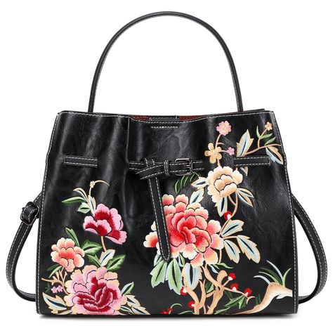 PRICES MAY VARY. Elegant Floral Design: This stylish handbag features vibrant floral embroidery on high-quality vegan leather (PU), offering a blend of sophistication and femininity. It pairs perfectly with both casual outfits and traditional Chinese cheongsams. Spacious and Functional: Designed with ample interior space, this bag easily fits all your essentials like a wallet, phone, makeup, and small accessories, keeping you organized on the go. Adjustable & Versatile Strap: The detachable, adj Leather Tote Bag Women, Vegan Leather Tote Bag, Vegan Leather Tote, Purses For Women, Embroidered Leather, Elegant Floral, Small Accessories, Traditional Chinese, Leather Tote Bag