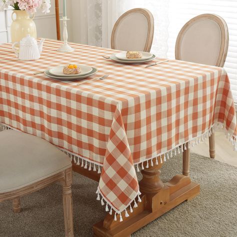 PRICES MAY VARY. Classic Gingham Tablecloth: Features the classic buffalo checkered pattern in orange and white to create the best farmhouse look, edged in jaunty tassels for a refined finish and playful touch to your decor! Rustic in appearance that suits farmhouse, rustic, or modern decor styles, and will instantly lift the mood of anyone who comes to eat with you Tassel edge design: The linen tablecloth with delicate checked patterns and beautiful fringe tassel gives you a decent elegant feel Buffalo Plaid Fall Table, Dining Room Orange, Thanksgiving Table Cover, Fall Table Cloth, Fall Tablecloth, Thanksgiving Tablecloth, Gingham Tablecloth, Checkered Tablecloth, Plaid Tablecloth