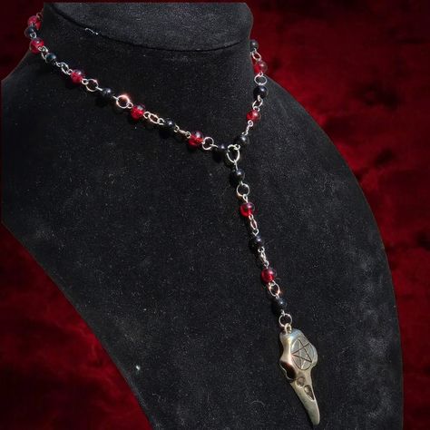 "ravens blood" handmade rosary choker🥀 a piece I've been waiting on spooky season to release!! - handmade using glass beads + stainless steel findings + repurposed charm - $25 (US ONLY) - free repairs on all orders ☆tags #jewelry #jewelrymaker #jewelrymaking #smallbusiness #smallshop #smallbusinessowner #smallbusinesssupport #smallartist #jewellery #jewelrydesigner #gothic #goth #gothaesthetic #gothfashion #spookyseason #emofashion #altfashion #handmadejewellery #handmadejewelry #handmadeacc... Gothic Jewelry Diy, Red Goth, Handmade Rosary, Shop Inspiration, Goth Necklace, Alternative Jewelry, Goth Aesthetic, Diy Sewing Clothes, Emo Fashion