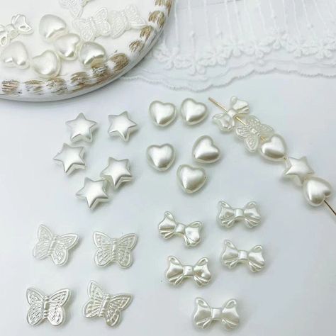 PRICES MAY VARY. ⭐PLENTY BEADS - Totally 200 PCs ABS beads assortments are packed in 4 bags, it is convenient for you to collect and avoid 4 styles mix together(star, heart, butterfly, bowknot shape, each style has 50 pcs), wholesale quantity can meet your various DIY making needs and share with your friends. 🤍EXQUISITE BEADS - The aesthetic beads are made of high quality ABS material, safe, durable and smooth, which can give you nice touch feeling. Each bead has imitation pearl coating on the Aesthetic Beads, Butterfly Beads, Making Bracelets, Jewelry Making Bracelet, Jewelry Making Kit, White Butterfly, How To Make Necklaces, Nail Arts, Beads For Jewelry Making