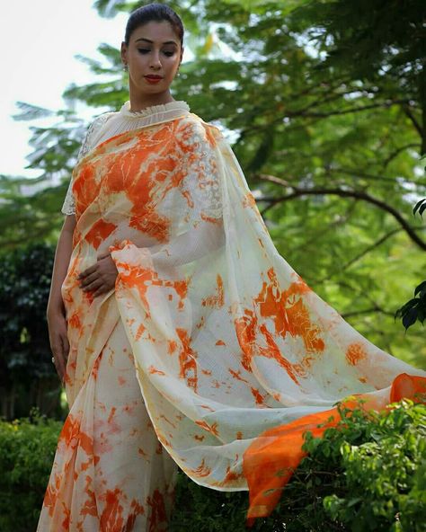 Orange marble slice tye and dye saree! #saree #sari #sareenotsorry #sarilove #sareelove #orange #white #orangeandwhite #orangewhitesaree #orangeandwhitesaree #marble #marblecake #marbleprints #frills #ruff #frilly #frillyblouse #lace #lacelove #laceblouse #whiteblouse #whitelace #whitelaceblouse #tyeanddye #tieanddie Tie Dye Saree, Tie And Dye Saree, Orange Marble, Tye And Dye, Cotton Saree Blouse Designs, Cotton Saree Blouse, Orange Tie Dye, Frilly Blouse, White Saree