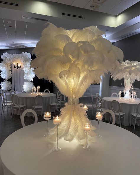 Tall Feather Centerpieces, Feathers And Candles Centerpieces, Feather And Pearl Centerpieces, Gold Ostrich Feather Centerpiece, Wedding Ideas Fancy, Black And White Gala Centerpieces, Feather And Flowers Centerpieces, Masquerade Ball Table Decor, Feather Party Decorations