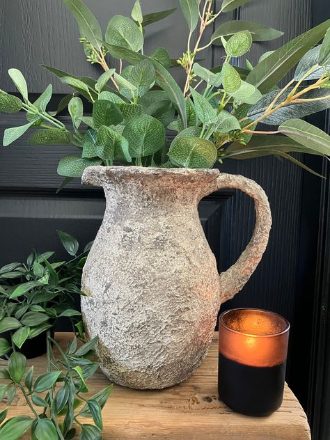 This ceramic jug has been up cycled to resemble a faux concrete/stone. It has been hand painted in a beautiful matt velvet beige and various shades of brown.  Perfect if you're looking for a piece of rustic home decor. Display alone or add dried/faux stems of your choice to suit your colour scheme. Small rubber feet have been added to the base of the vase/jug to protect your furniture.   Matching items are available - please see separate listings. **PLEASE NOTE** although the exterior has been c Diy Vases, Faux Stems, Madrid Apartment, Home Decor Display, Stone Vase, Carpet Trends, Concrete Stone, Jug Vase, Hand Painted Vases