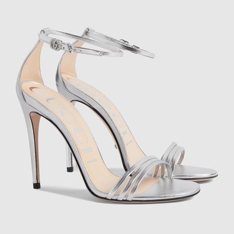 Shop the Women's heeled metallic sandal in silver at GUCCI.COM. Enjoy Free Shipping and Complimentary Gift Wrapping. Sandals Gucci, Womens Strappy Sandals, Gucci Heels, Designer High Heels, Patent Shoes, Block Heel Sandals, Metallic Sandals, Gold Sandals, Stiletto Sandals