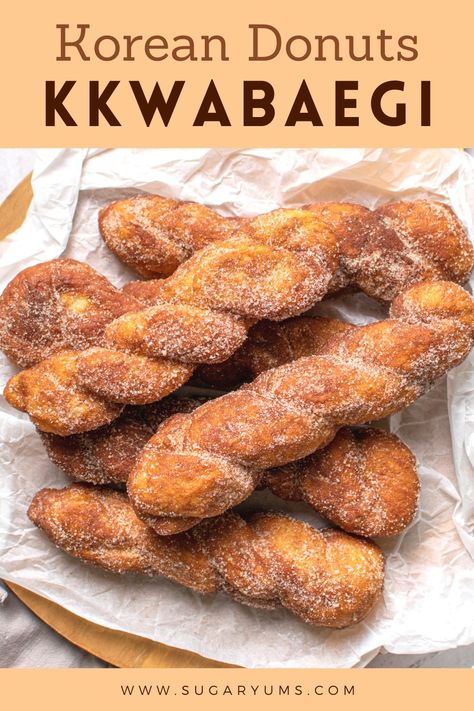 Kkwabaegi in a pile on top of baking paper Korean Donuts Recipe, Sugar Twist, Overnight Breakfast Casserole, Cinnamon Twists, Bread Breakfast, Korean Recipes, Amazing Desserts, Vegan Bakery, Baking Basics