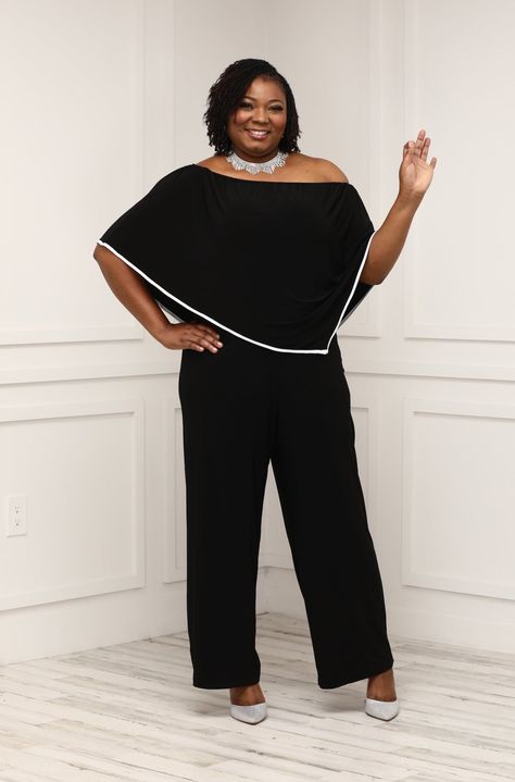 Our plus-size poncho-trimmed overlay jumpsuit is a must-have for curvy women. This plus-size black jumpsuit is made with an off-the-shoulder neckline and an overlay design with white piping for added arm and tummy coverage. This off-the-shoulder plus-size jumpsuit from MSK is comfortable, stylish, and body-flattering Matte Jersey fabric Overlay Jumpsuit with white piped trim Off-shoulder with Elastic shoulder hold Wide-leg pant, with a pullover design Occasion: Plus size Jumpsuit, Dressy Jumpsui Plus Size Wedding Guest Outfit Pants, Plus Size Jumpsuit Outfit, Plus Size Pants Outfits Dressy, Wedding Pants Outfit, Formal Black Jumpsuit, Evening Wear Jumpsuits, Plus Size Wedding Guest Outfit, Overlay Jumpsuit, Unique Jumpsuits