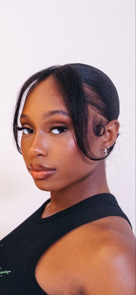 Hairstyles For Big Foreheads Black Women, Everyday Hairstyles For Natural Hair, Minimalist Hairstyles For Black Women, Relaxed Hair Bun Hairstyles, Sleek Bun With Bangs Black Women, Chic Natural Hairstyles For Black Women, Low Bun And Bangs, Sleek Bun With Two Strands, 4c Sleek Bun