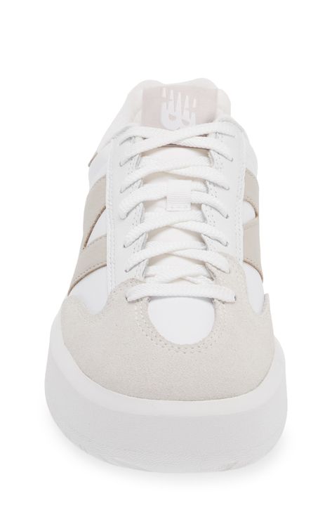 From the court to the street, this '80s-throwback tennis shoe scores new love as a sneaker made of leather and mesh with chunky proportions updating the look. The plush interior and supportive insole ground every step in game-winning comfort. Lace-up style Removable, cushioned insole with arch support Leather and textile upper/synthetic lining/rubber sole Imported Smart Casual Women White Sneakers, Sneakers For The Office Women, Tennis Shoes That Go With Everything, Formal Tennis Shoes, Dress Pants And Tennis Shoes, Women’s Outfits With Sneakers, Portugal Winter Fashion, Cute Shoes That Go With Everything, Trending White Sneakers For Women