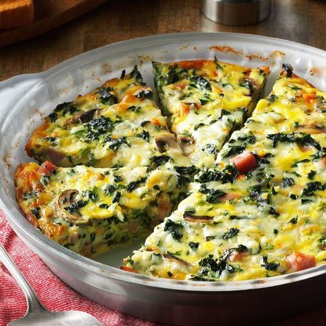 Crustless Spinach Quiche Recipe -I served this dish at a church luncheon and I had to laugh when one gentleman told me his distaste for vegetables. He, along with many others, were surprised how much they loved this veggie-filled quiche! —Melinda Calverley, Janesville, Wisconsin Crustless Spinach Quiche, Spinach Quiche Recipes, Quiche Dish, Spinach Quiche, Quiche Recipe, Crustless Quiche, Crumpets, Quiche Recipes, Breakfast Brunch Recipes