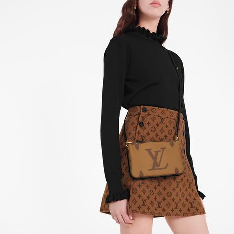 Double Zip Pochette Timeless Monogram and on-trend Monogram Giant Reverse canvas combine on the Double Zip Pochette, which comes with a removable, adjustable leather strap for multiple carry options. This versatile pouch features two zipped pockets to organize everyday essentials, one of which contains three card slots. The middle space offers easy access to items like tickets. Louis Vuitton Favorite Pm, Louise Vuitton, Pochette Louis Vuitton, Louis Vuitton Favorite, Louis Vuitton Store, Louis Vuitton Crossbody Bag, Reverse Canvas, Louis Vuitton Official Website, Louis Vuitton Crossbody