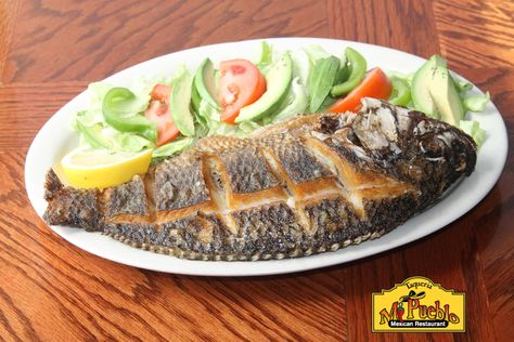 Mojarra Frita A whole tilapia deep fried served with white rice and tossed salad. #mexicantown #southwest #detroit #mipueblodetroit #mexicanfood #mojarra #fish #seafood Whole Tilapia, Restaurants Near Me, Tossed Salad, Fried Fish, White Rice, Bbq Grill, Fish And Seafood, Deep Fried, Fun Drinks